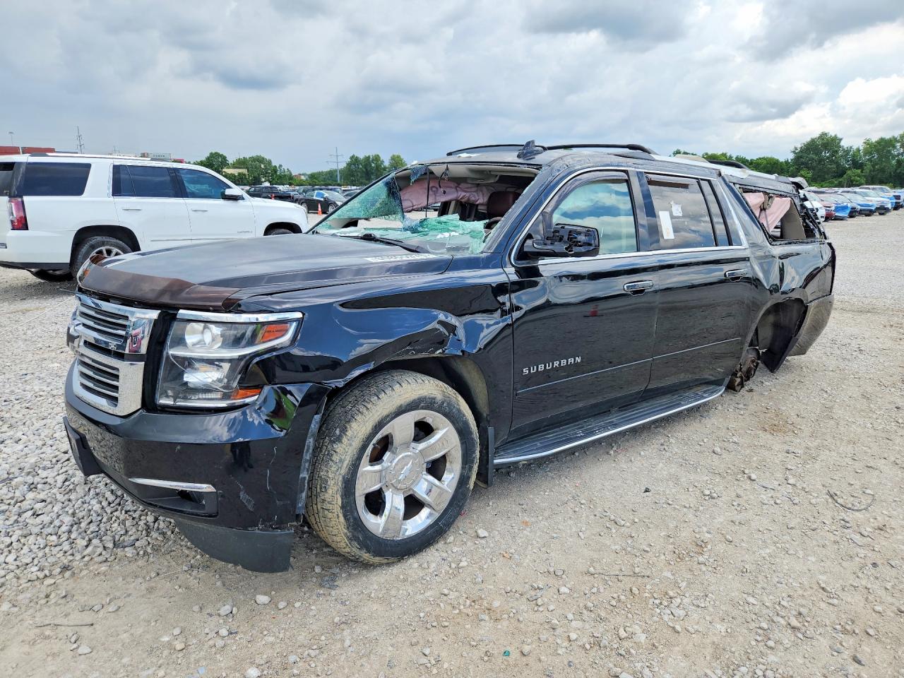 2017 Chevrolet Suburban Premier, VIN 1GNSKJKC1HR276704 — Rollover