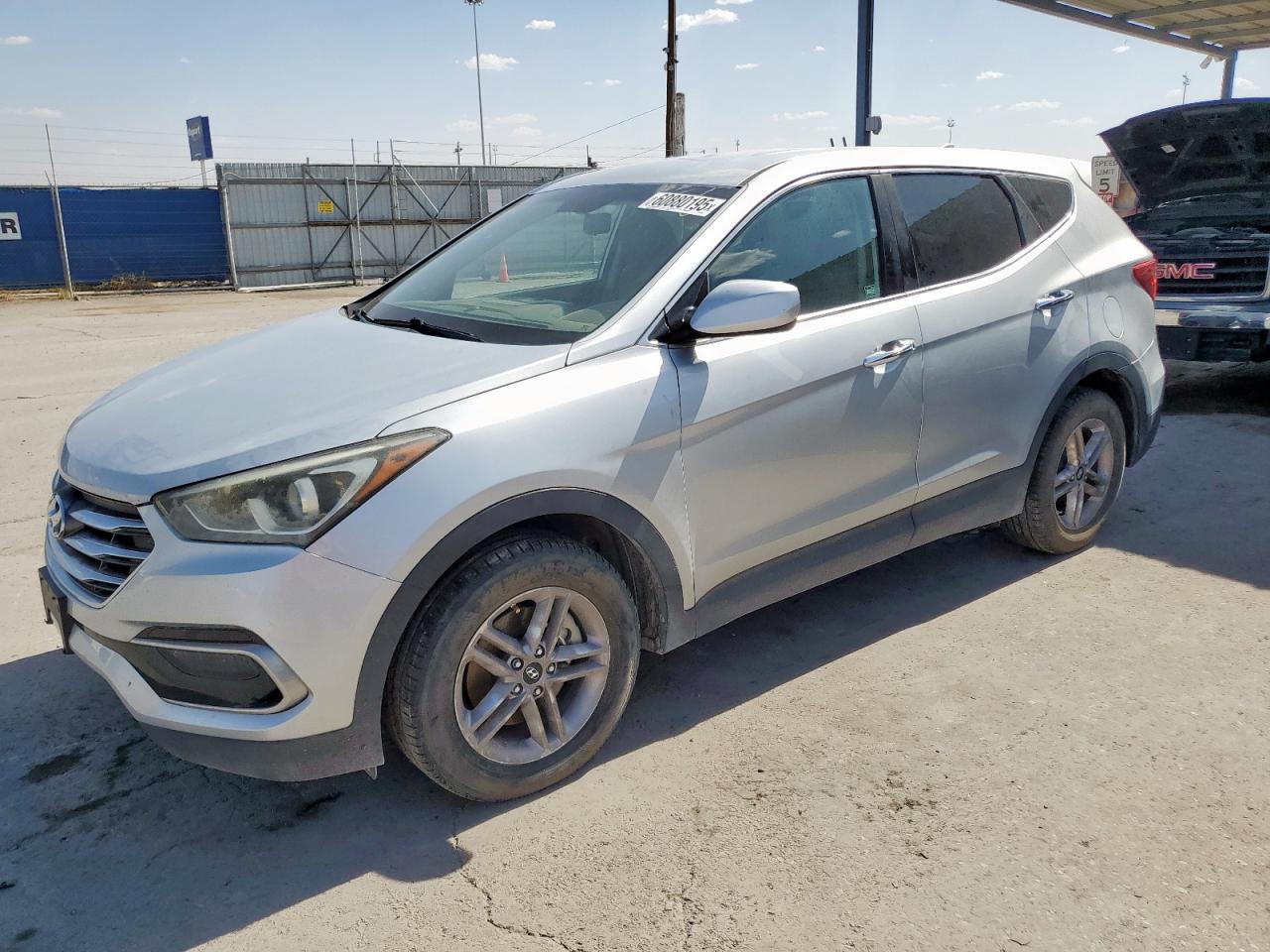 2017 Hyundai Santa Fe 2.4L, VIN 5XYZTDLB4HG449643 — Undercarriage