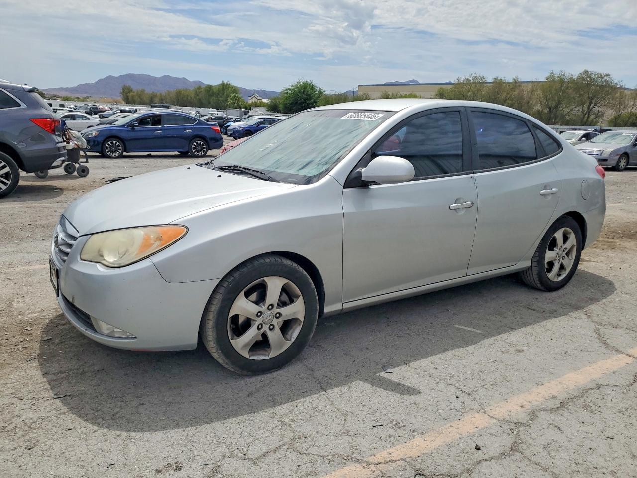 2010 Hyundai Elantra GLS, VIN KMHDU4AD7AU998524 — Vandalism