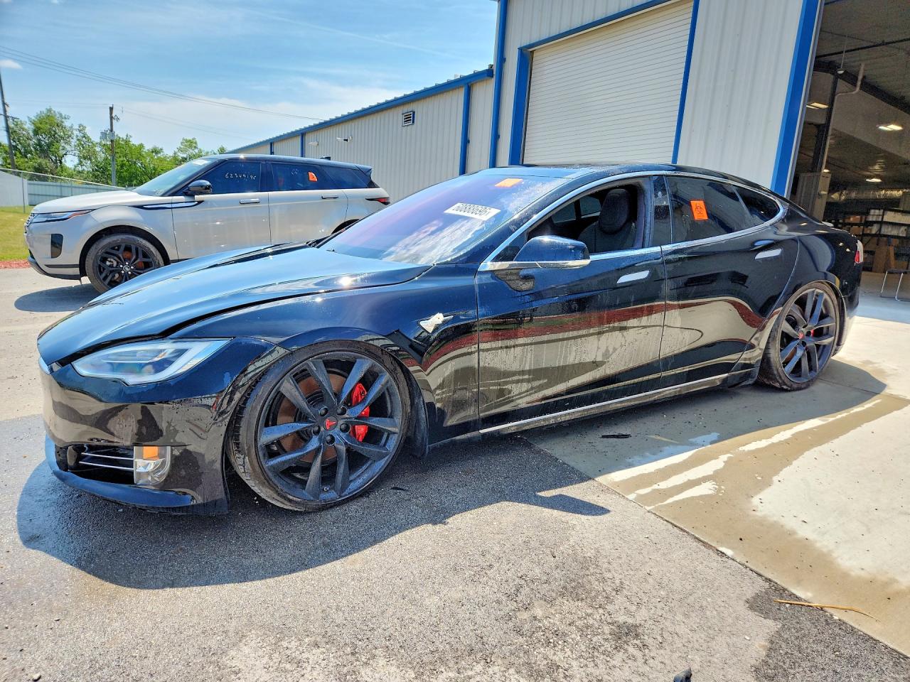2018 Tesla Model S 75D, VIN 5YJSA1E41JF285480 — Side