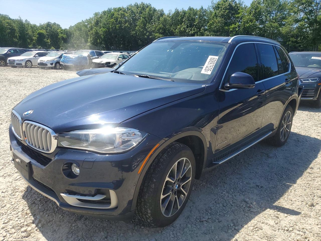 2014 BMW X5 xDrive50i, VIN 5UXKR6C57E0J72749 — Rear end