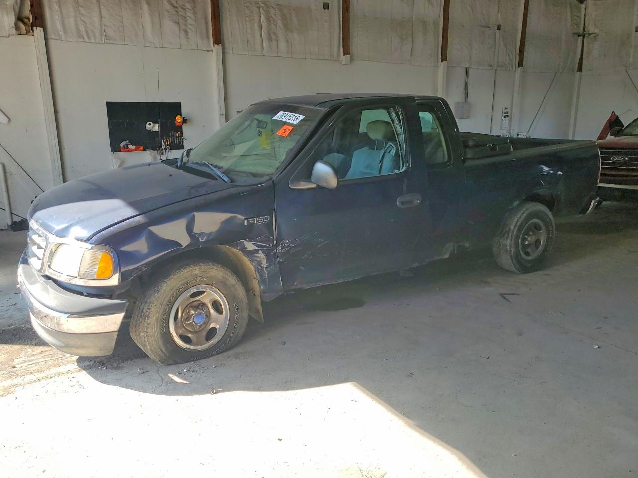 2003 Ford F-150 XL, VIN 1FTRX17273NA62759 — Side