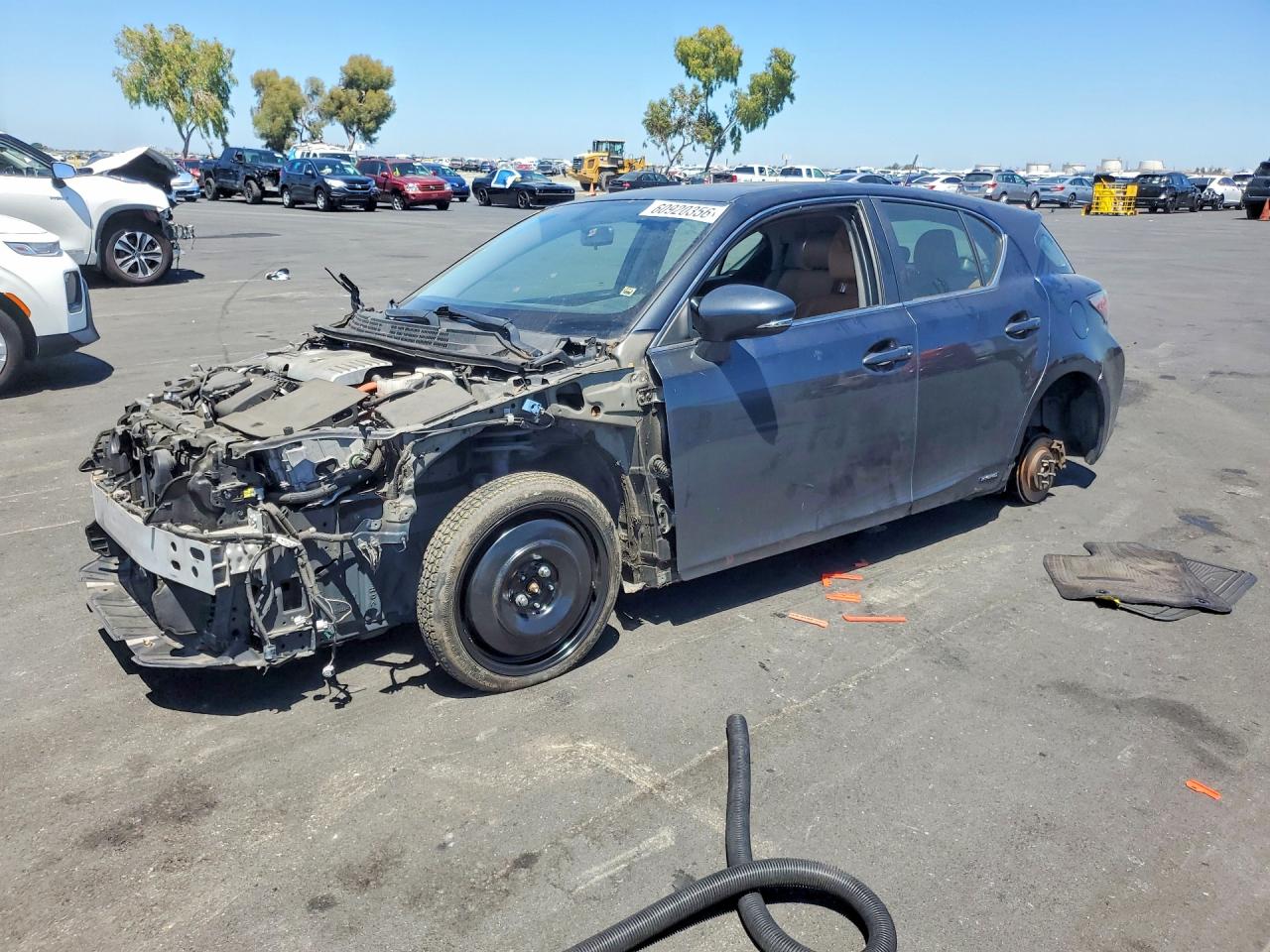 2011 Lexus CT 200h Premium, VIN JTHKD5BHXB2028973 — Vandalism