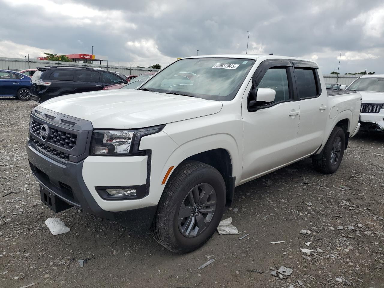 2025 Nissan Frontier SV, VIN 1N6ED1EK7SN613116 — Бок