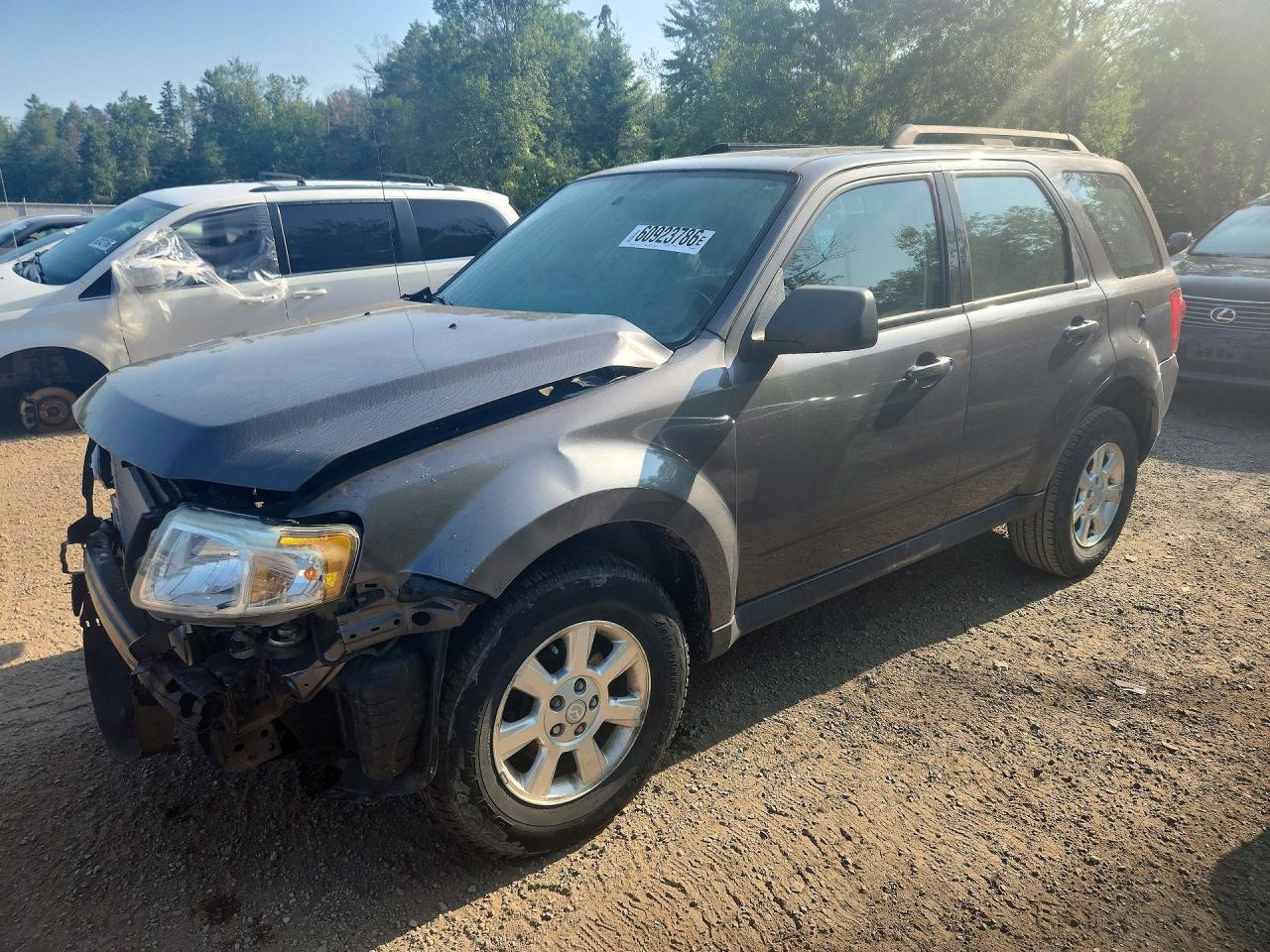 2011 Mazda Tribute Touring, VIN 4F2CY9C77BKM02995 — Перед