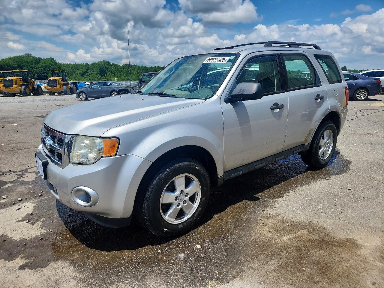 2009 Ford Escape XLS, VIN 1FMCU02779KD08243 — Бок