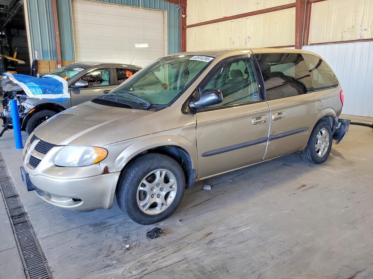 2004 Dodge Caravan SXT, VIN 1D4GP45R44B509546 — Зад
