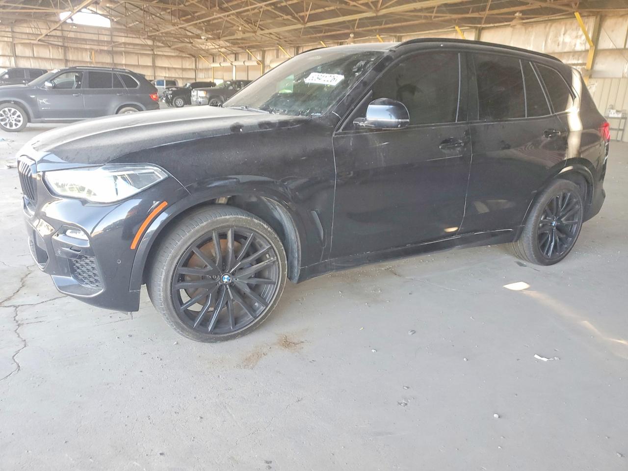 2020 BMW X5 M50i, VIN 5UXJU4C05L9B94196 — Minor dents and scratches