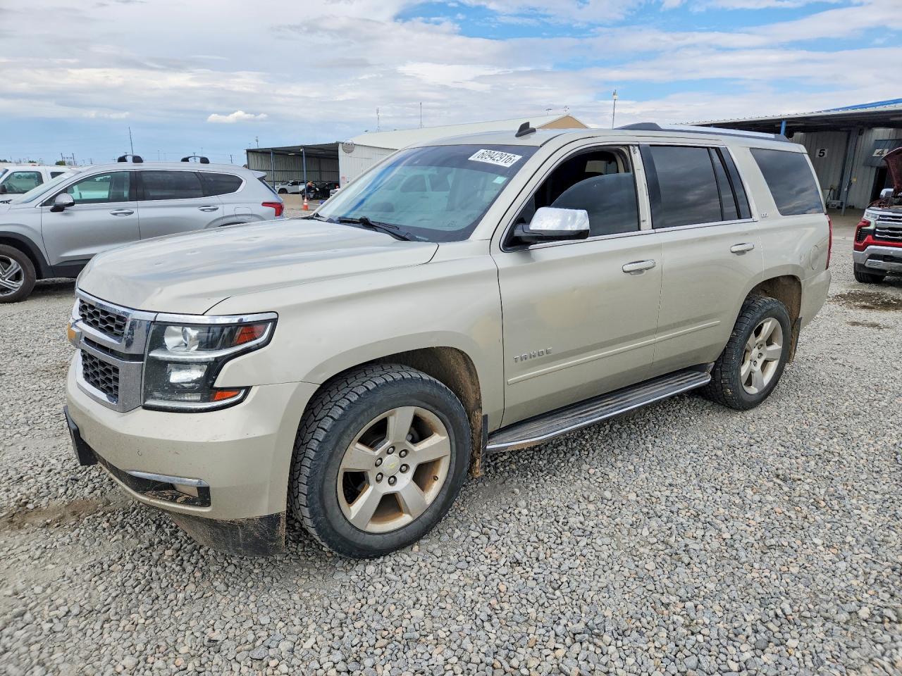 2015 Chevrolet Tahoe LTZ, VIN 1GNSKCKC5FR143436 — Hail