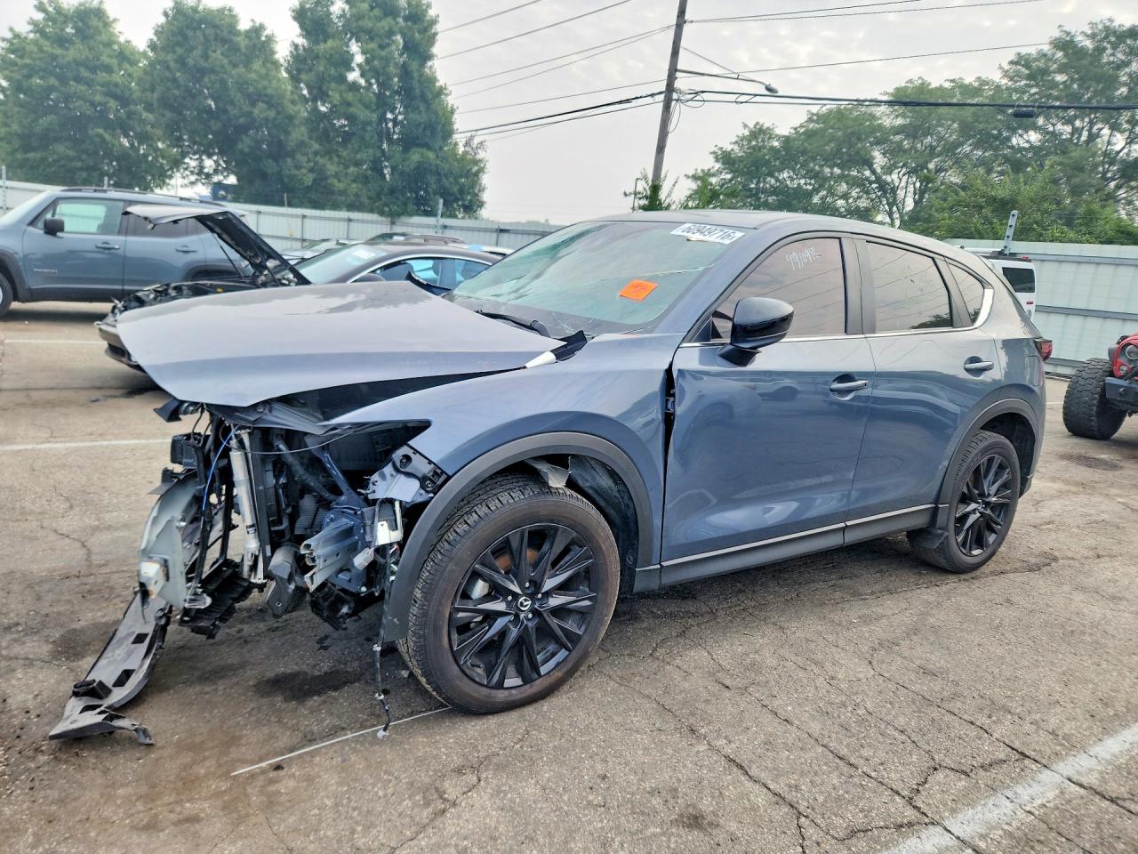 2025 Mazda CX-5 S Carbon Edition, VIN JM3KFBCM0S0694975 — Бок