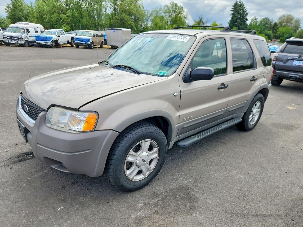2001 Ford Escape XLT, VIN 1FMCU04121KF92278 — Зад