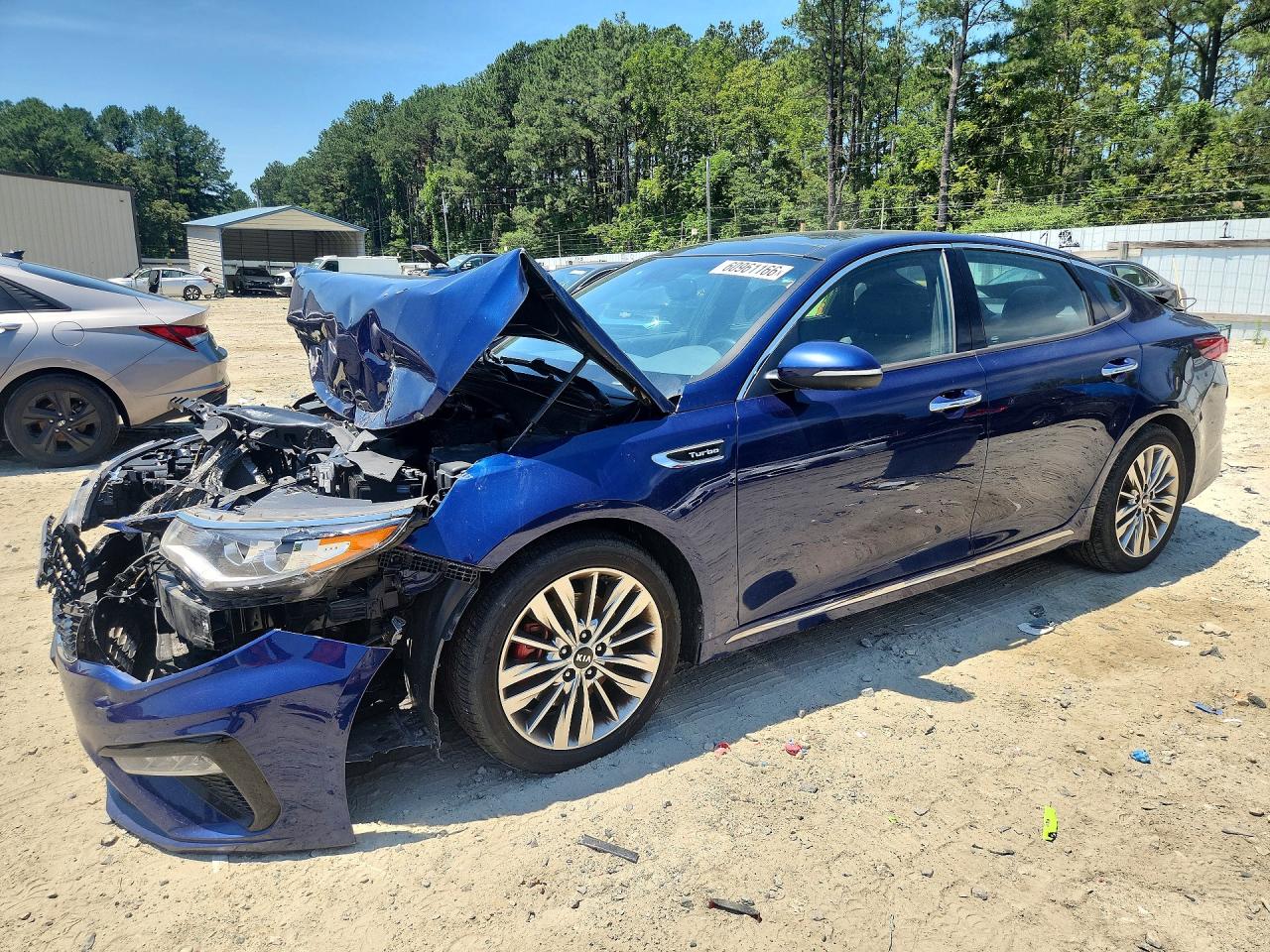 2019 Kia Optima SX, VIN 5XXGV4L21KG290237 — Front end
