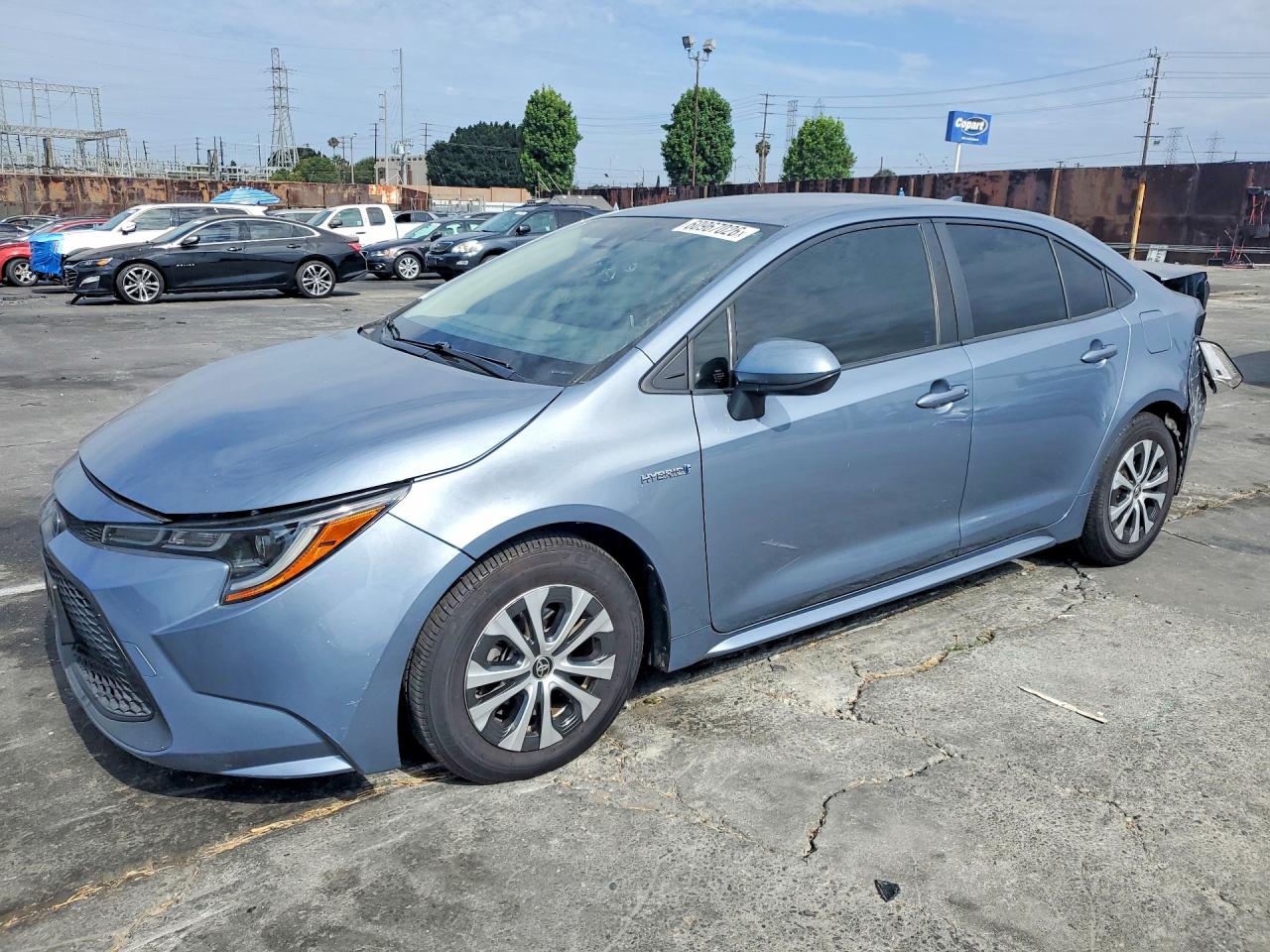 2021 Toyota Corolla Hybrid LE, VIN JTDEAMDE8MJ007908 — Rear end
