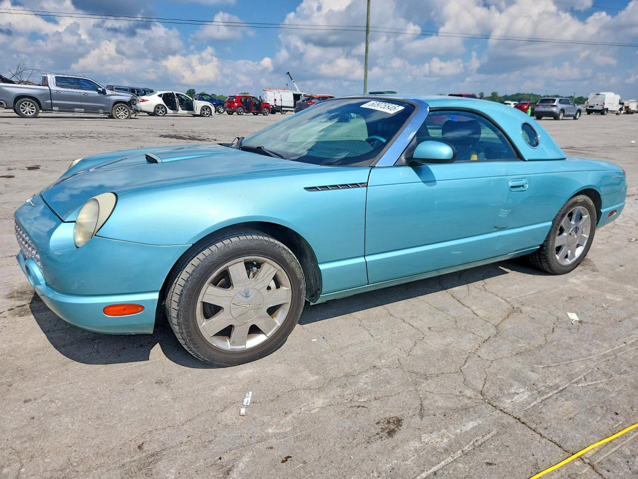 2002 Ford Thunderbird Hardtop Premium, VIN 1FAHP60A12Y100676 — Бок