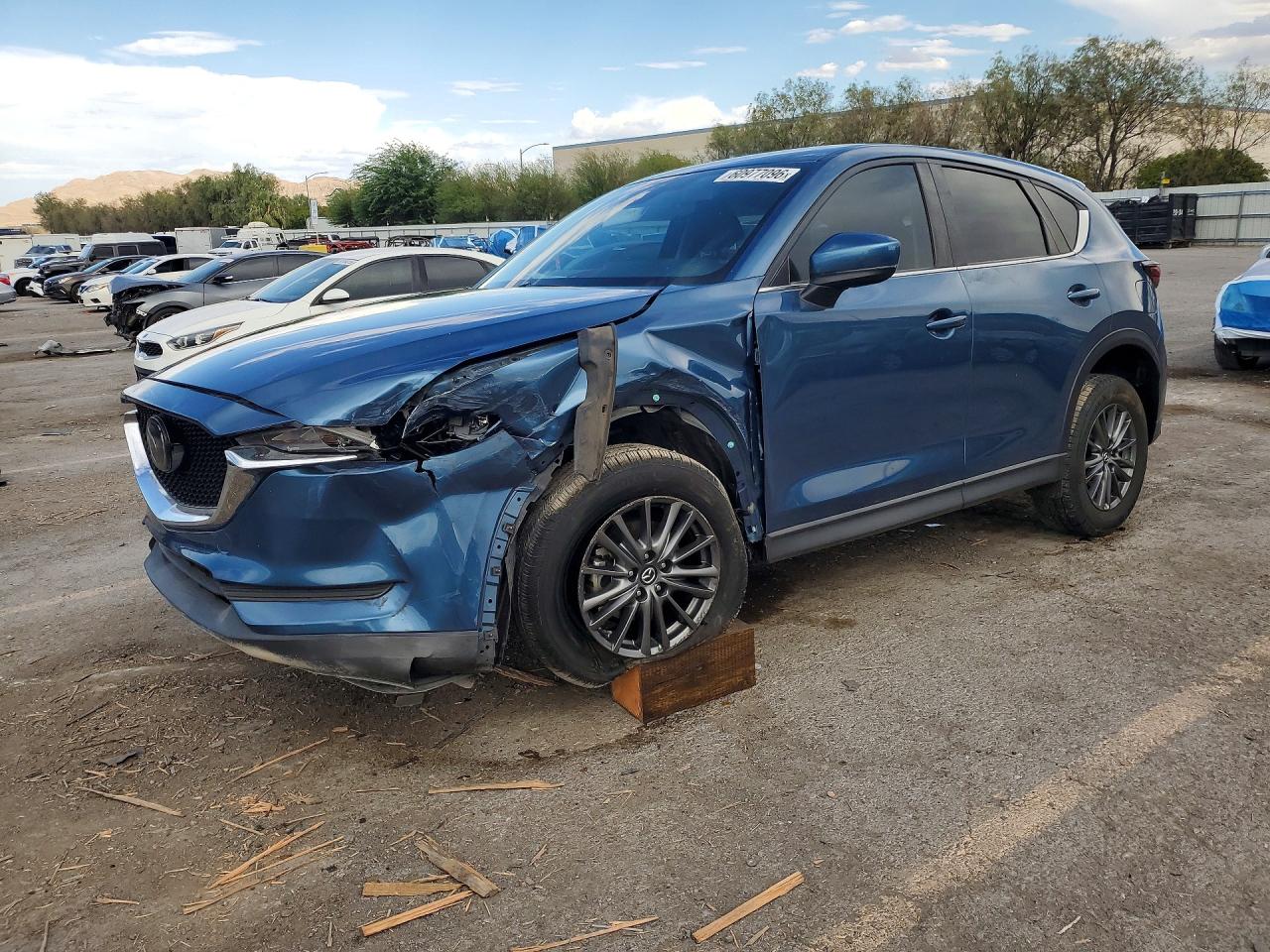2021 Mazda CX-5 Touring, VIN JM3KFBCMXM0441584 — Front end