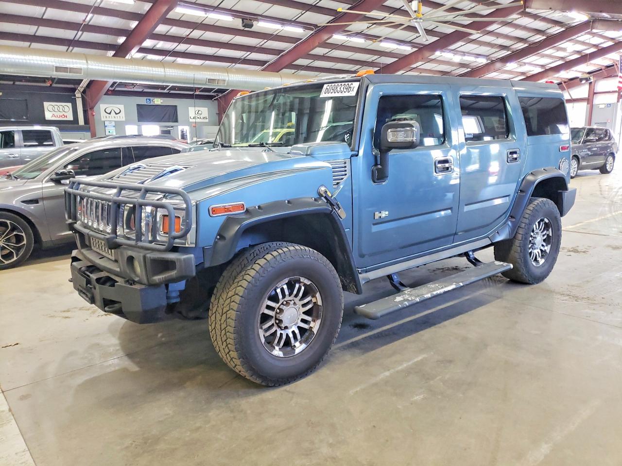 2005 Hummer H2 SUV, VIN 5GRGN23U65H100699 — Minor dents and scratches