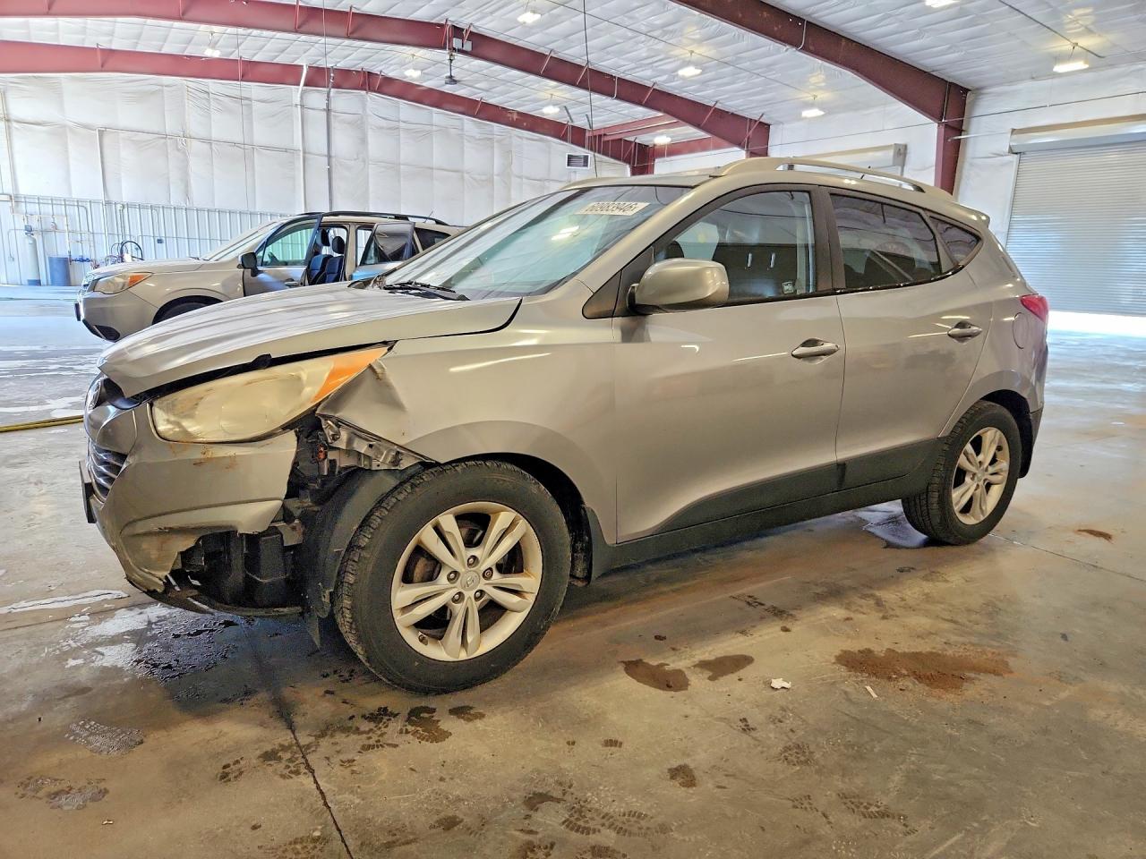 2011 Hyundai Tucson GLS, VIN KM8JU3AC0BU293022 — Hail