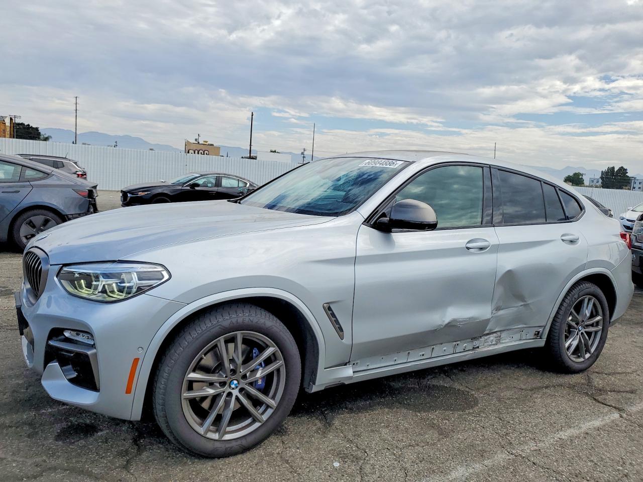 2019 BMW X4 M40i, VIN 5UXUJ5C52KLJ63767 — Side