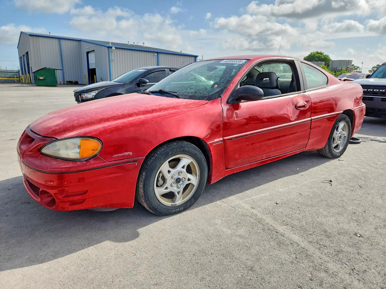 2004 Pontiac Grand Am GT, VIN 1G2NW12E84C176094 — Side