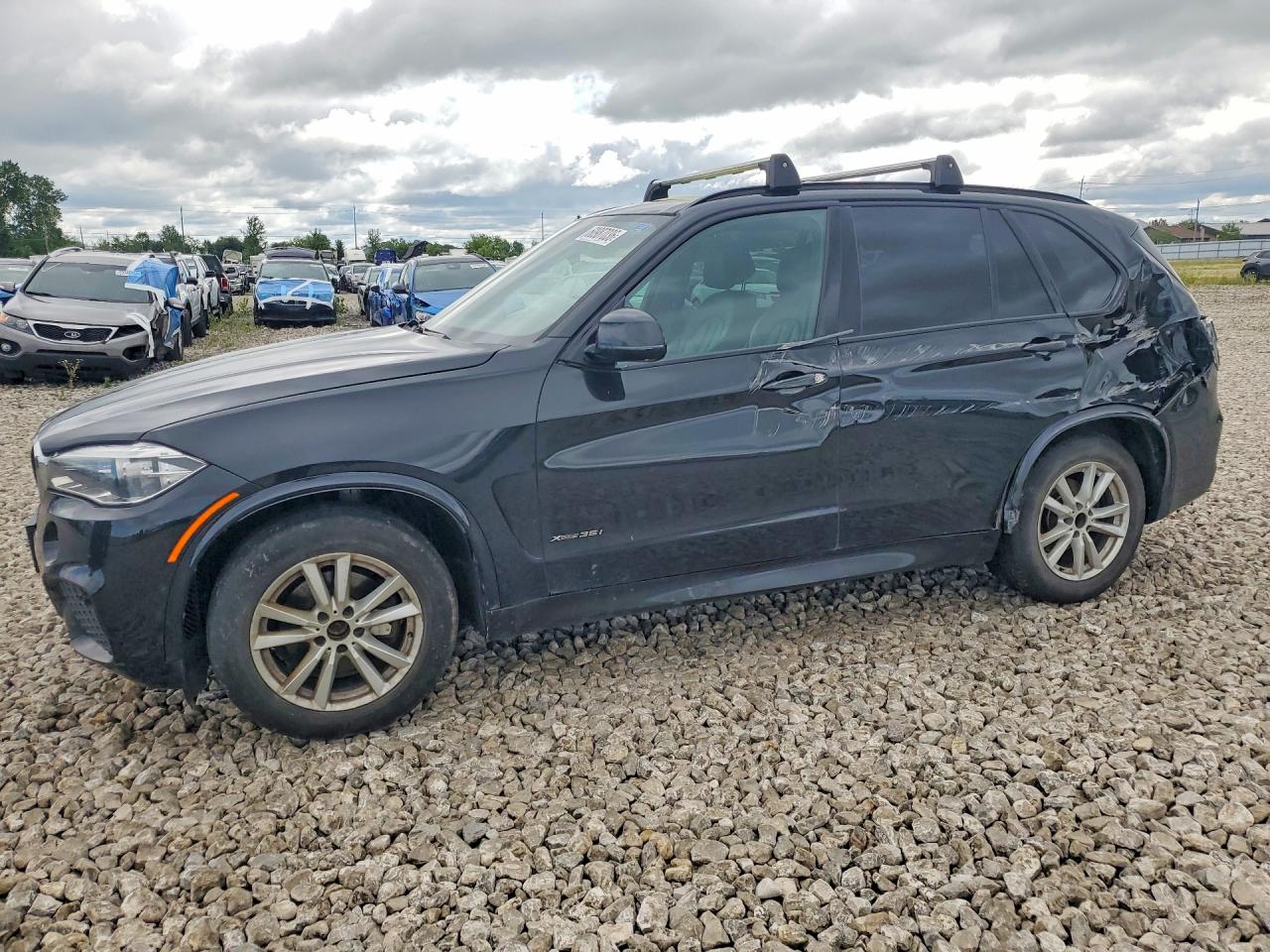 2018 BMW X5 xDrive35i, VIN 5UXKR0C57JL070390 — Бок