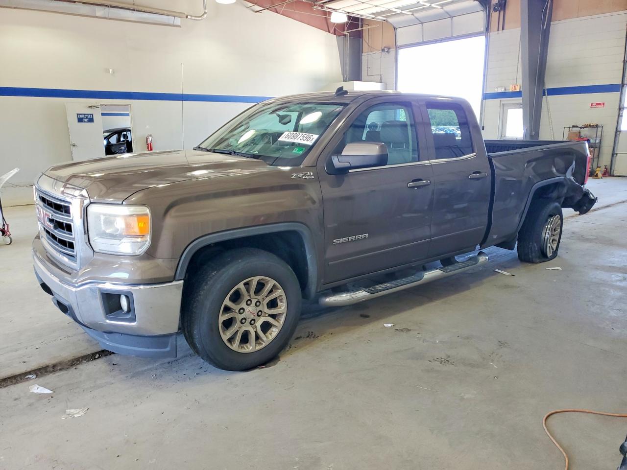2014 GMC Sierra 1500 SLE, VIN 1GTV2UEH3EZ233718 — Rear end