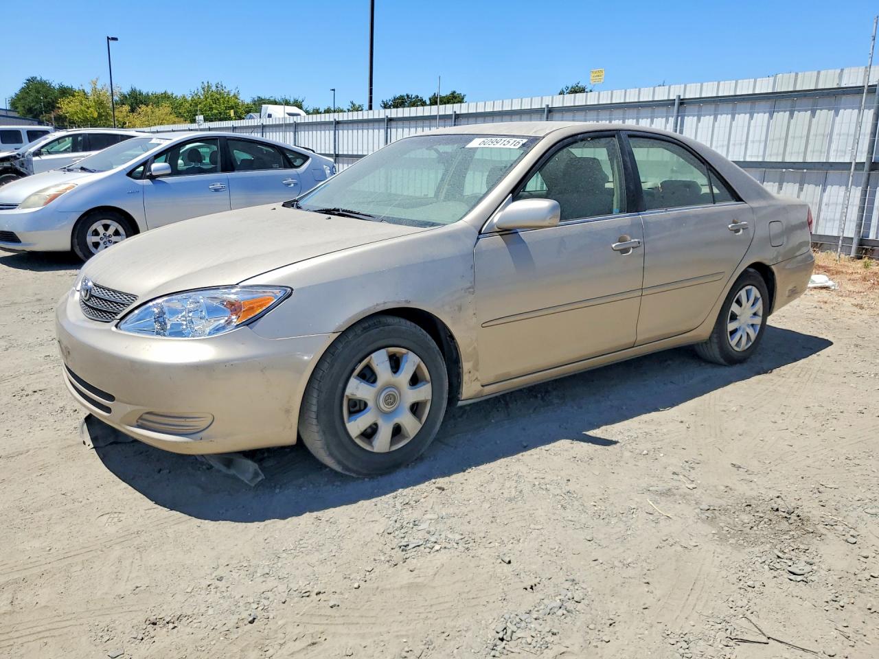 2002 Toyota Camry LE, VIN JTDBE32K520115786 — Prior damage history