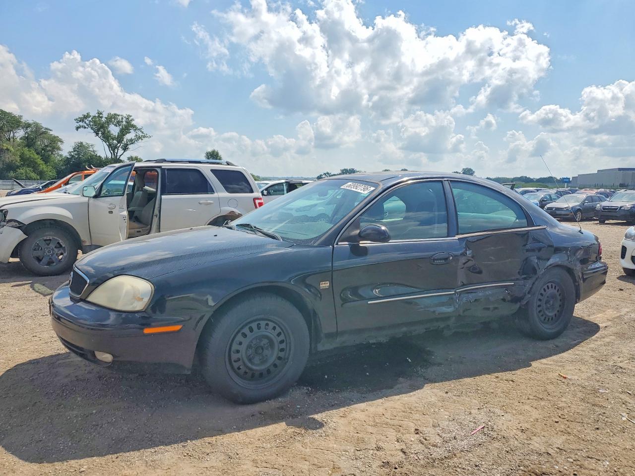 2001 Mercury Sable LS Premium, VIN 1MEFM55S01G646359 — Side