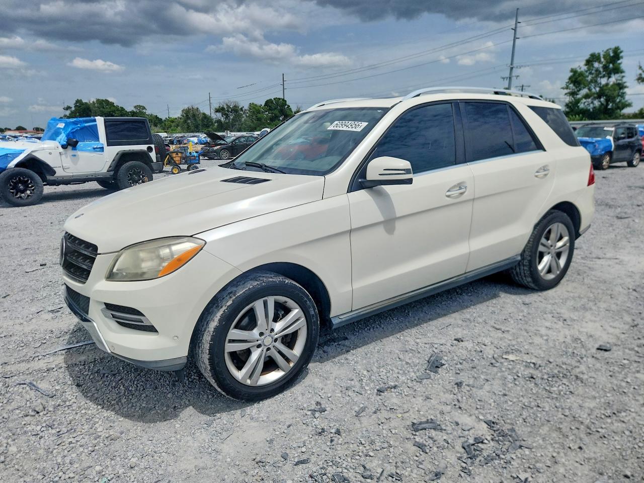 2015 Mercedes-Benz M 350, VIN 4JGDA5JB9FA455729 — Side