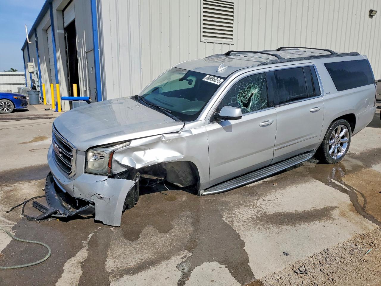 2015 GMC Yukon XL SLE, VIN 1GKS1GKCXFR734370 — Front end