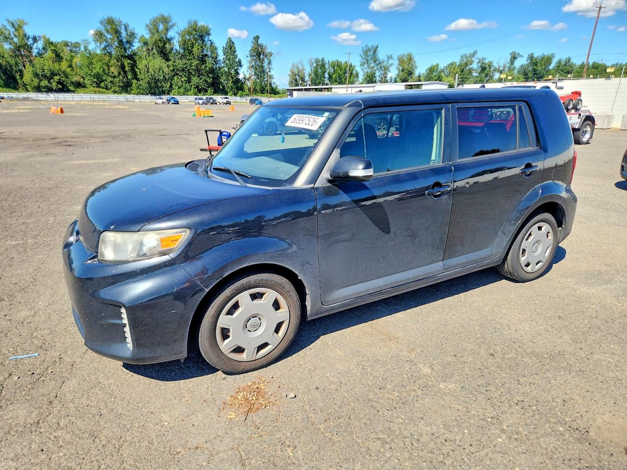 2014 Scion xB Release Series 10.0, VIN JTLZE4FE8EJ064490 — Бок
