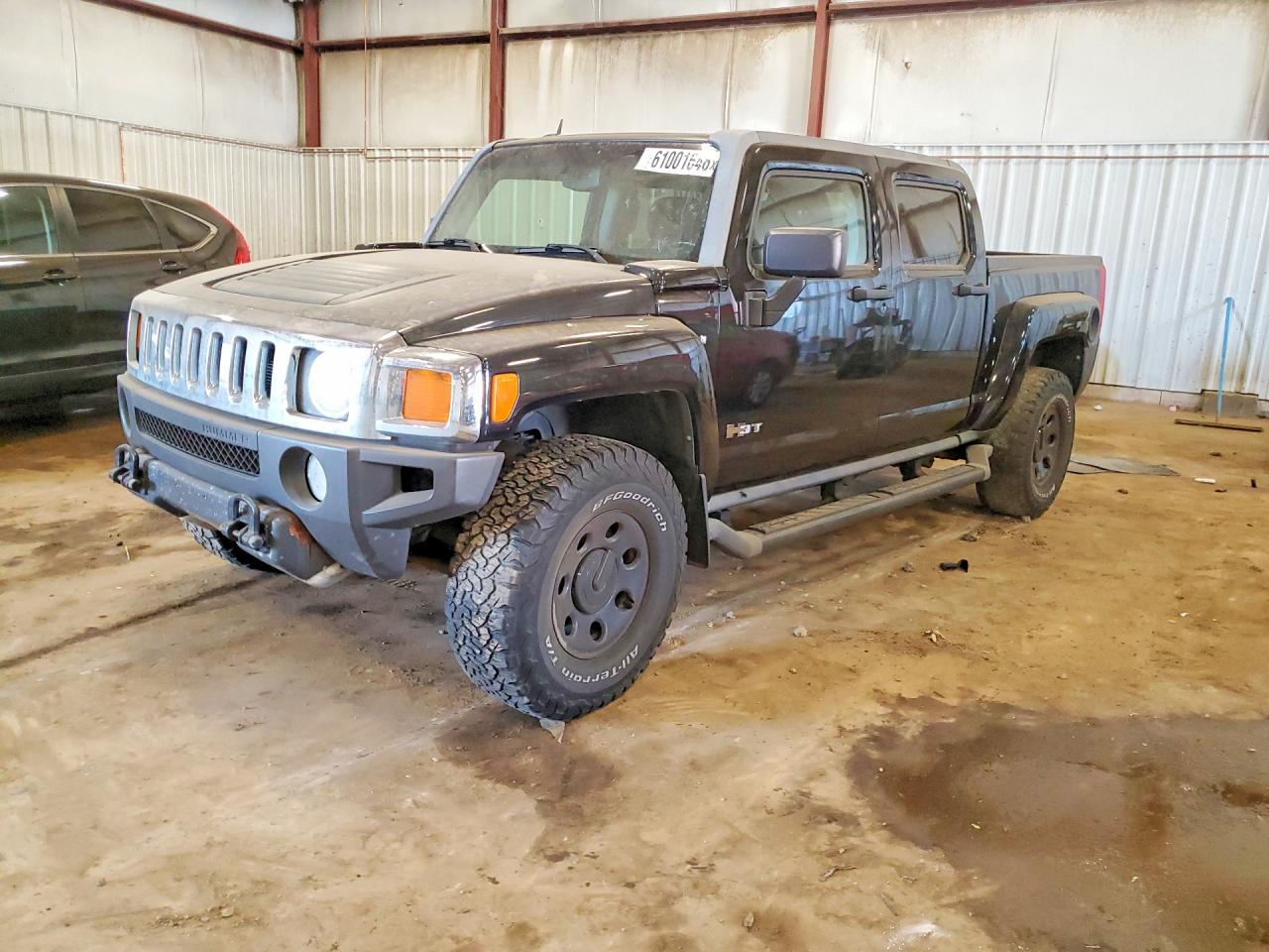 2009 Hummer H3 H3T, VIN 5GNEN13E698148334 — Side