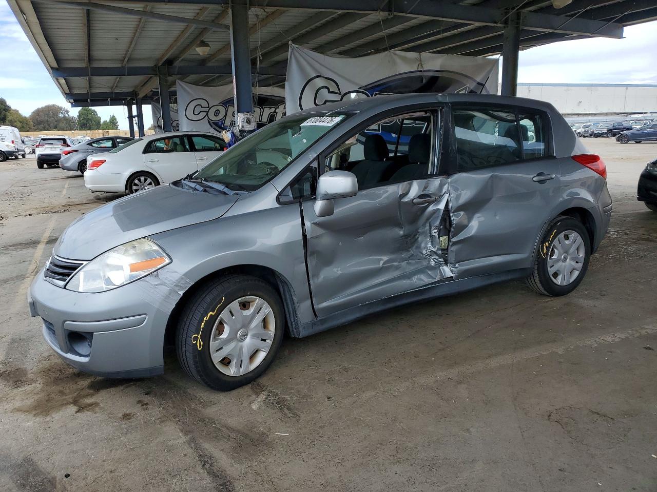 2011 Nissan Versa S, VIN 3N1BC1CP6BL474865 — Side