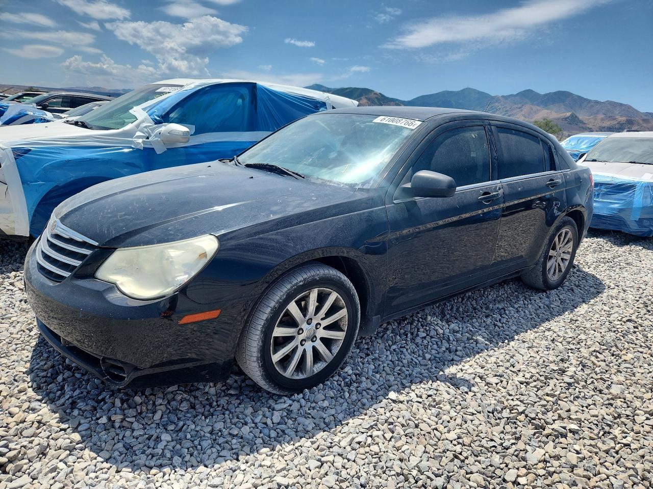 2010 Chrysler Sebring Limited, VIN 1C3CC5FB5AN135090 — Rear end