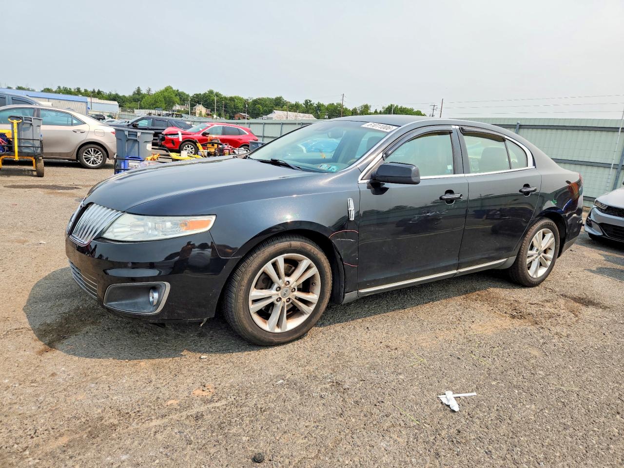 2011 Lincoln MKS, VIN 1LNHL9DRXBG605737 — Front end