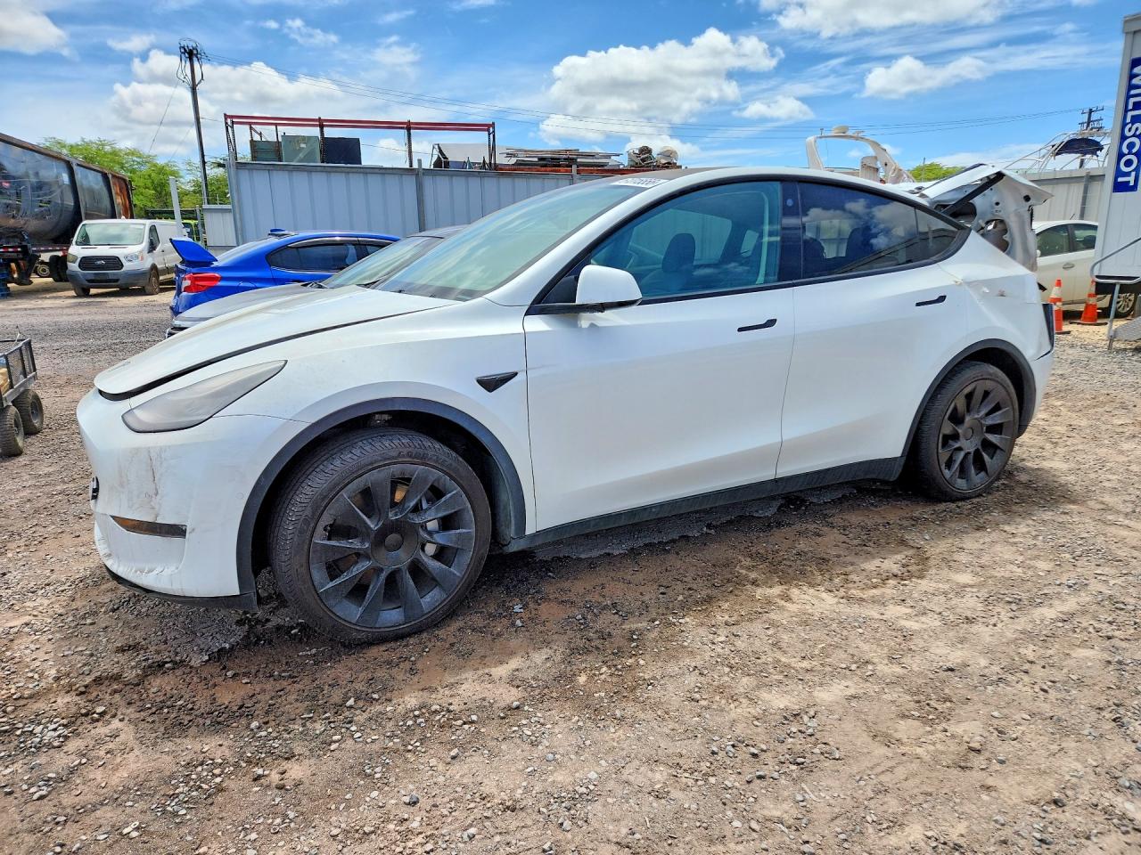 2021 Tesla Model Y Standard Range, VIN 5YJYGDED6MF192792 — Rear end