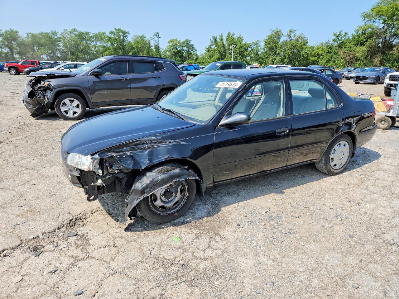 2001 Toyota Corolla LE, VIN 2T1BR12E61C401105 — Front end