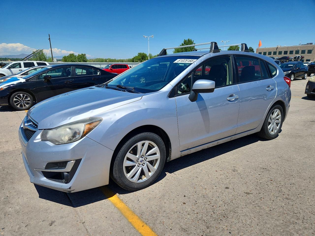 2015 Subaru Impreza Premium, VIN JF1GPAC67F8317063 — Hail