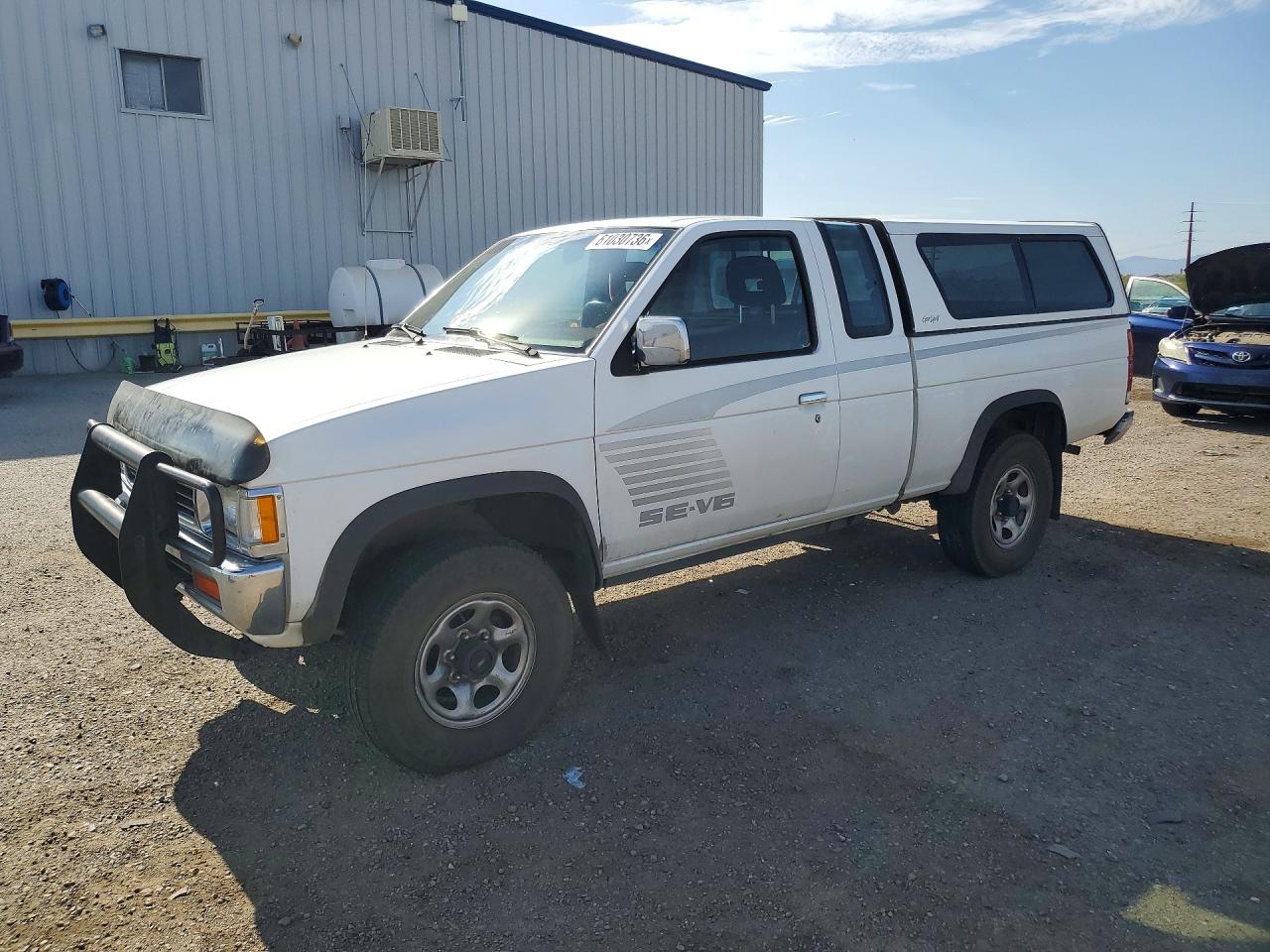 1993 Nissan Frontier SE, VIN 1N6HD16Y2PC393337 — Normal wear