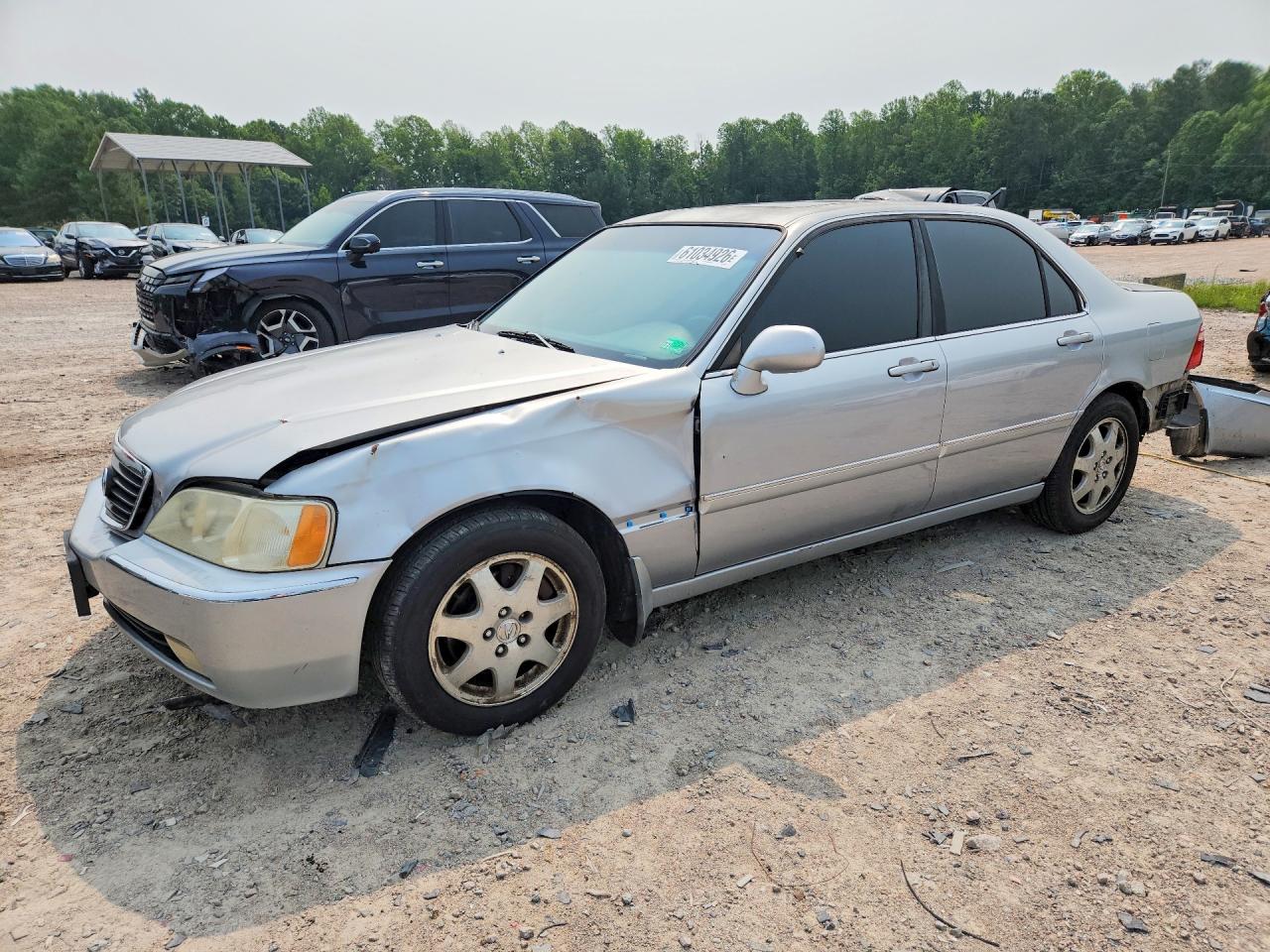 2002 Acura RL, VIN JH4KA96592C007364 — Rear end