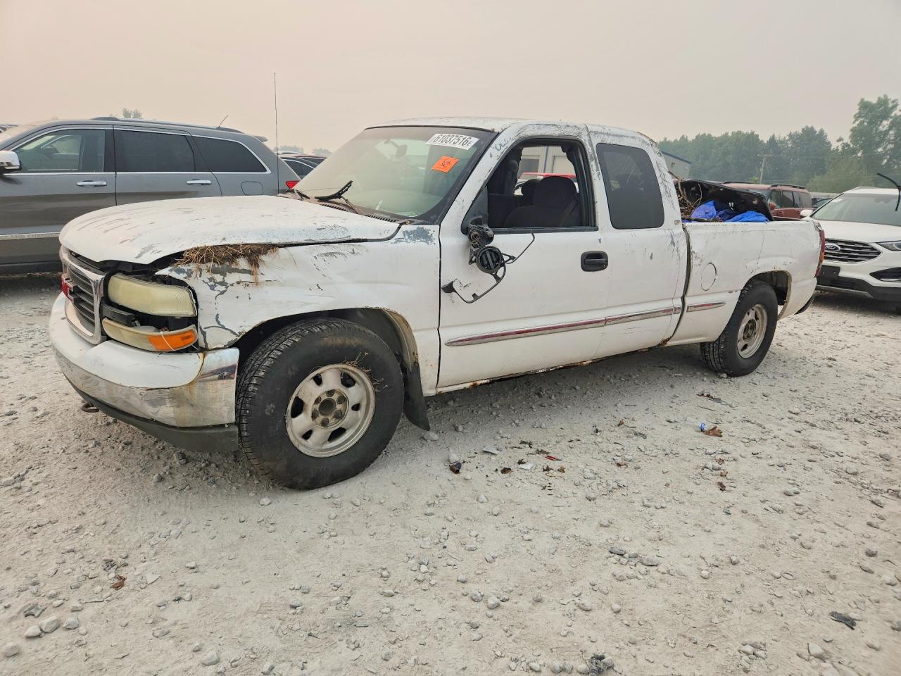 2001 GMC Sierra 1500 SLE, VIN 2GTEC19VX11125112 — Side