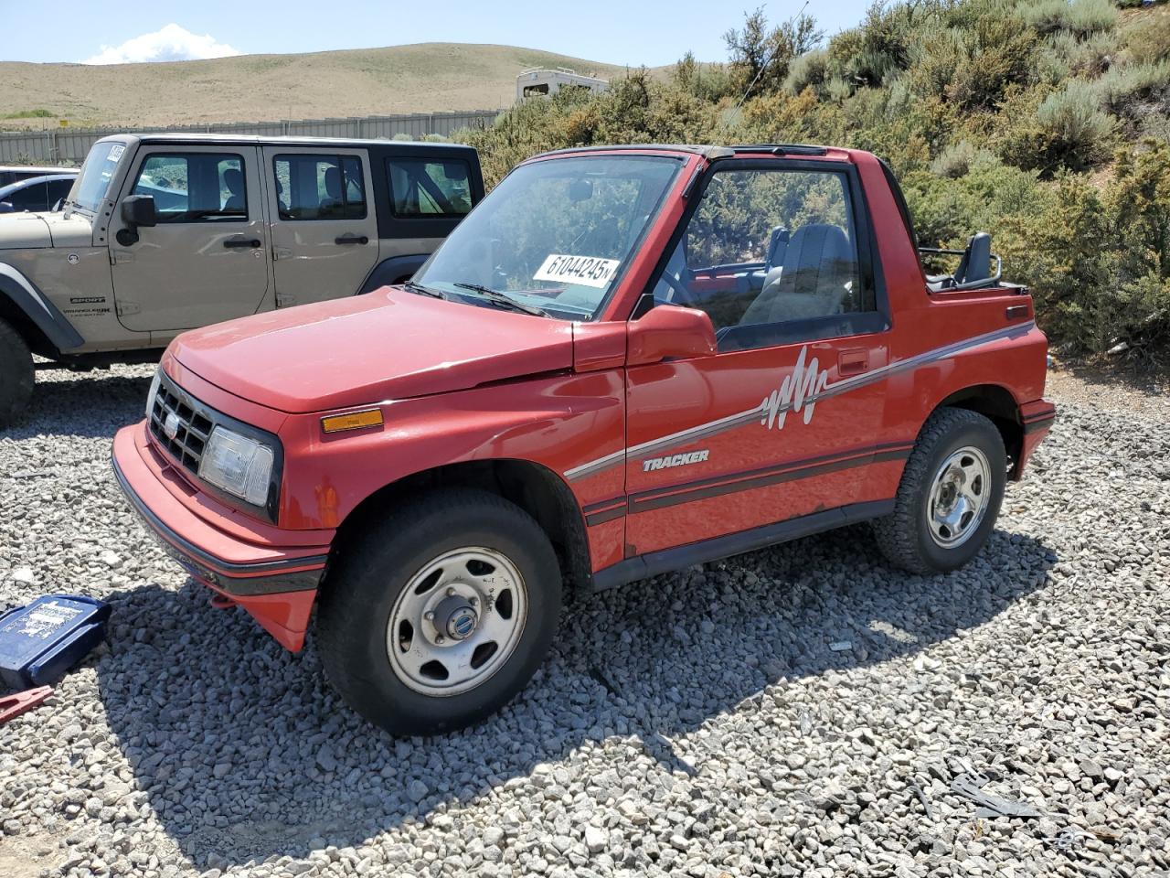 1990 Geo Tracker, VIN 2CNBJ18U2L6205765 — Мелкие вмятины и царапины