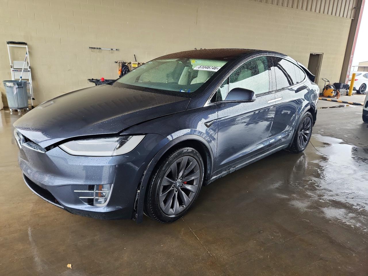 2018 Tesla Model X 75D, VIN 5YJXCDE44JF081127 — Rear end