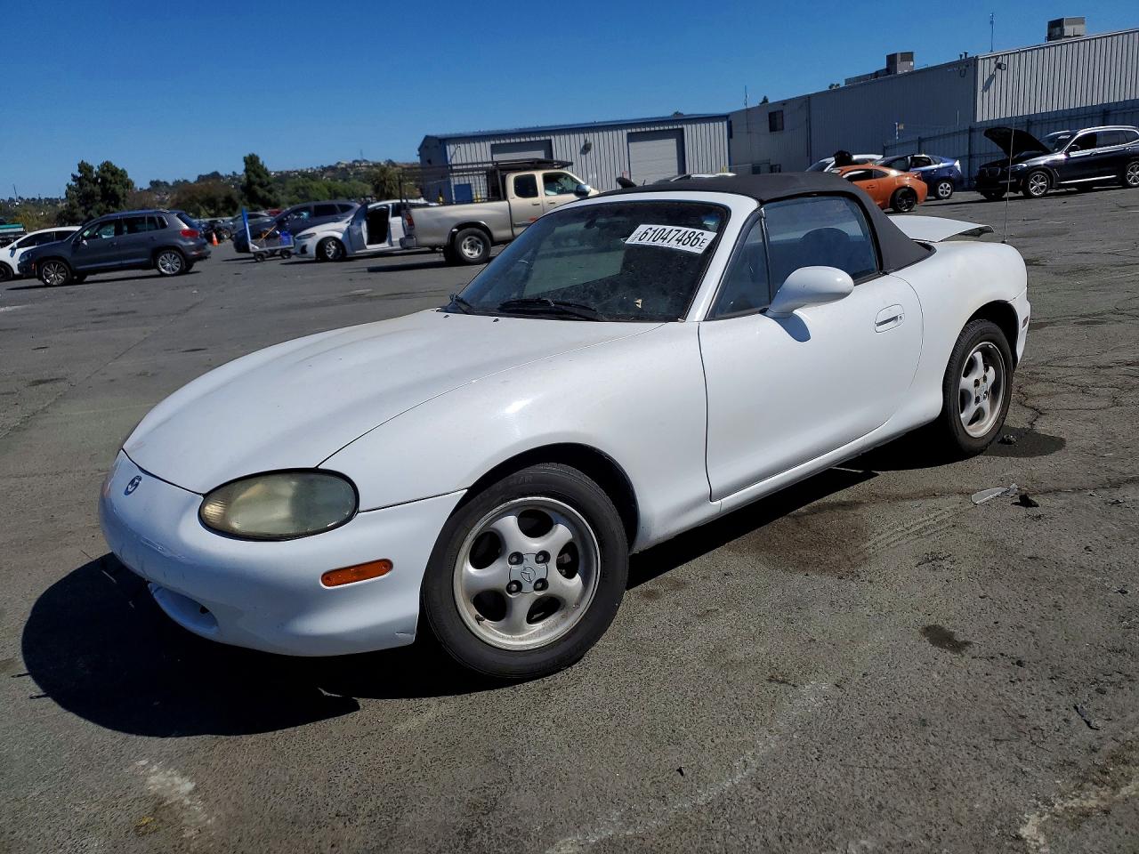 1999 Mazda MX-5 Miata, VIN JM1NB353XX0124629 — Rear end