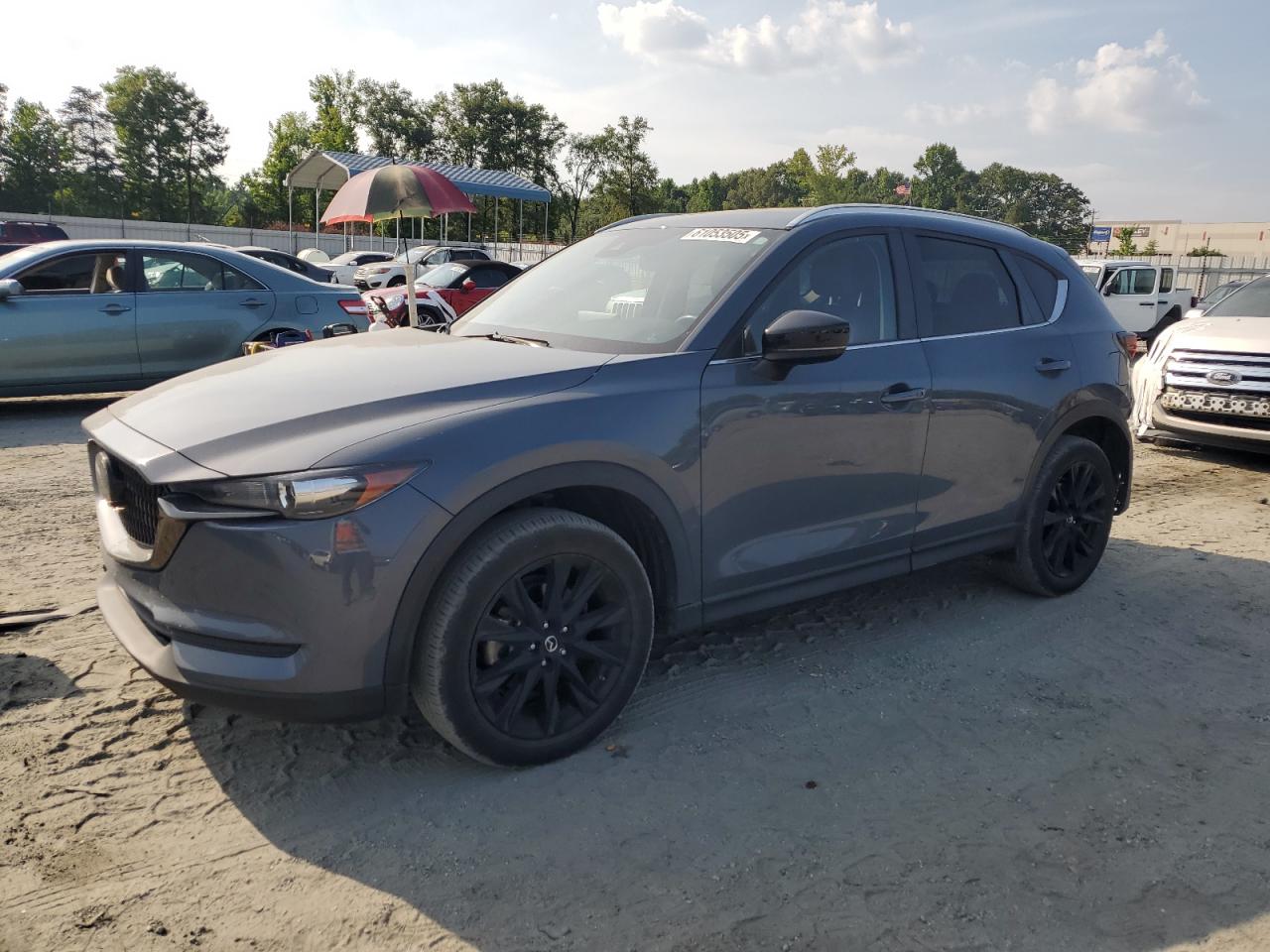 2021 Mazda CX-5 Carbon Edition, VIN JM3KFBCY8M0418601 — Rear end