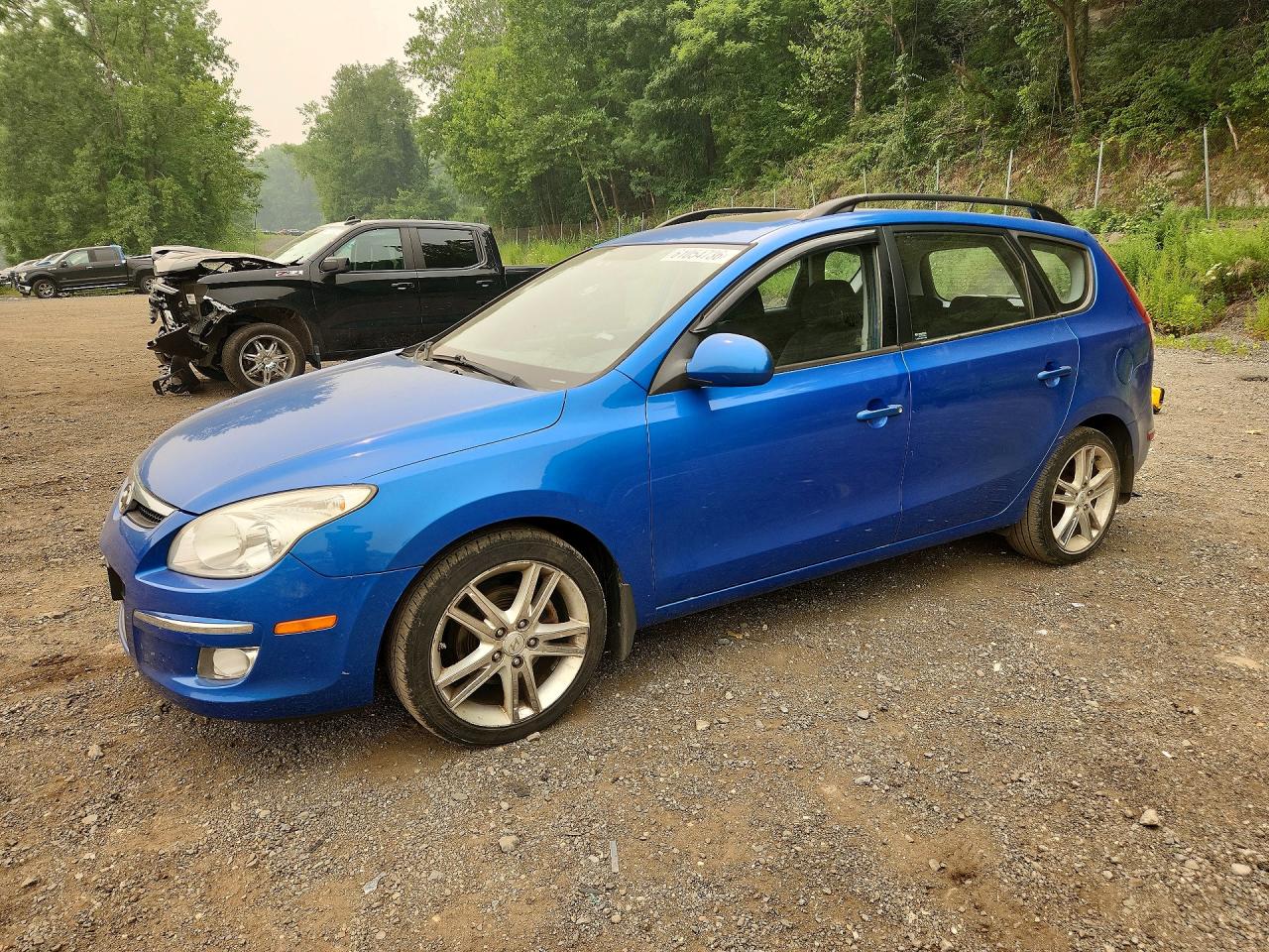 2010 Hyundai Elantra SE, VIN KMHDC8AE6AU057035 — Side