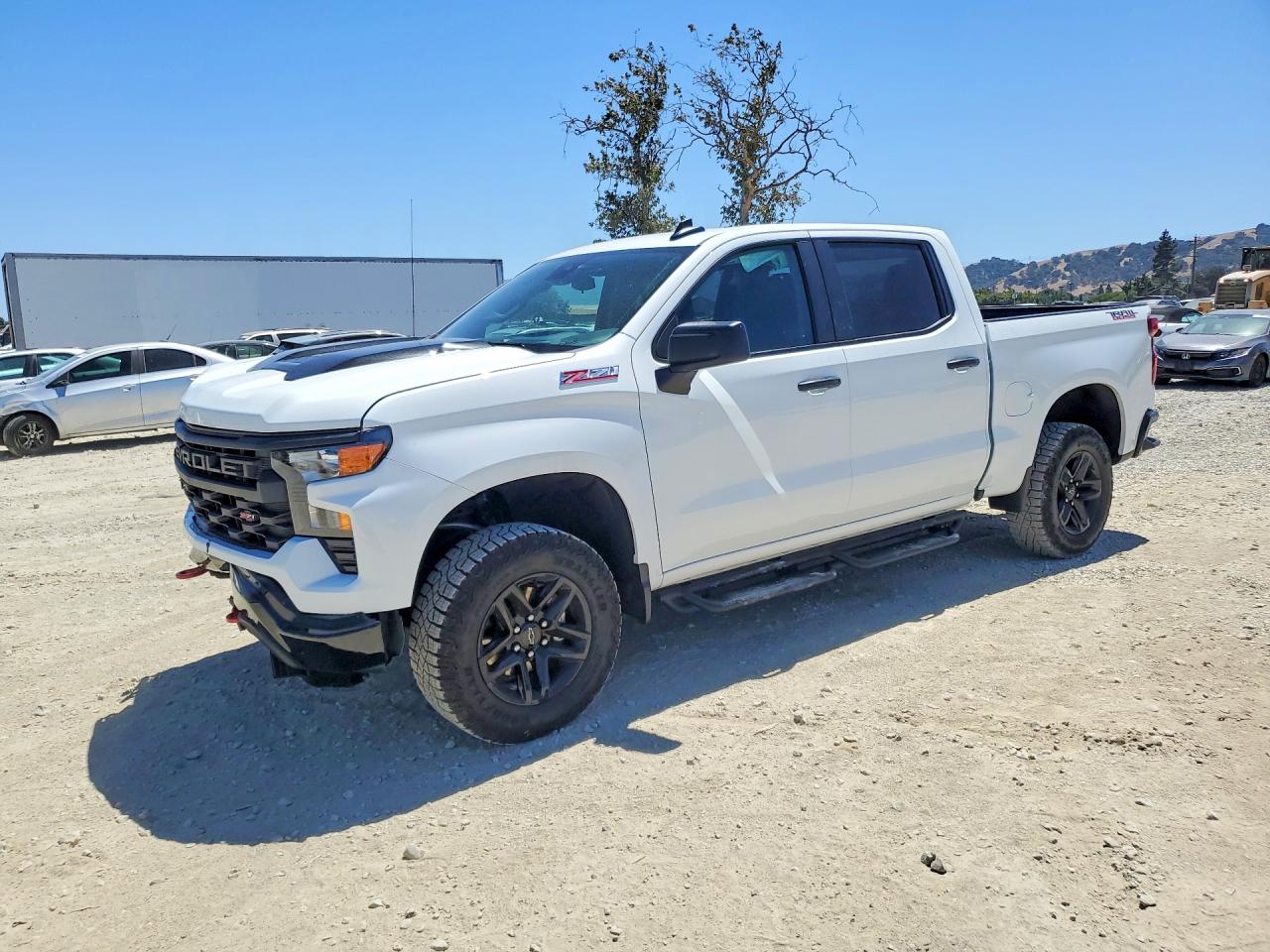 2025 Chevrolet Silverado 1500 Custom Trail Boss, VIN 3GCUKCED1SG381963 — Front end