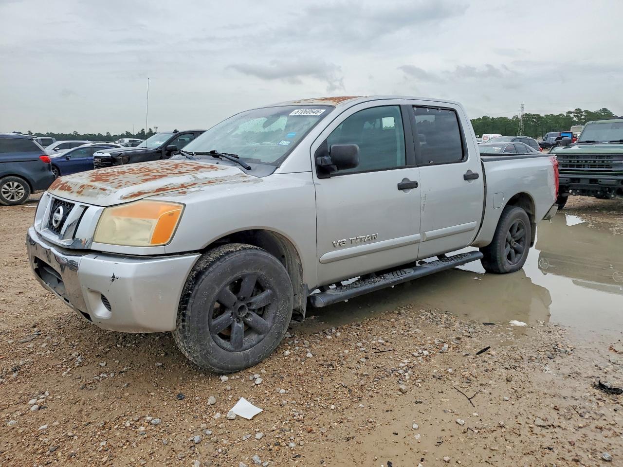 2009 Nissan Titan LE, VIN 1N6BA07D99N309980 — Minor dents and scratches