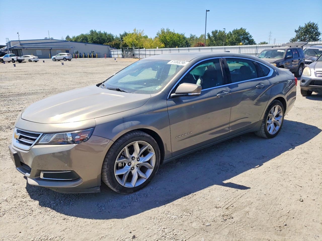 2017 Chevrolet Impala LT, VIN 2G1105S38H9179813 — Бок