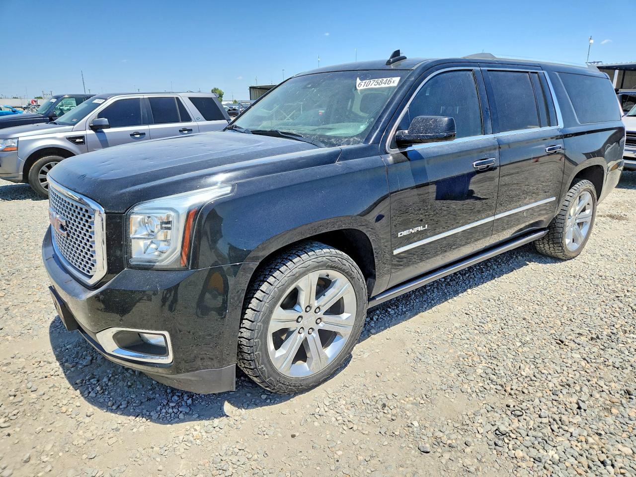 2016 GMC Yukon XL Denali, VIN 1GKS2HKJ0GR429947 — Hail