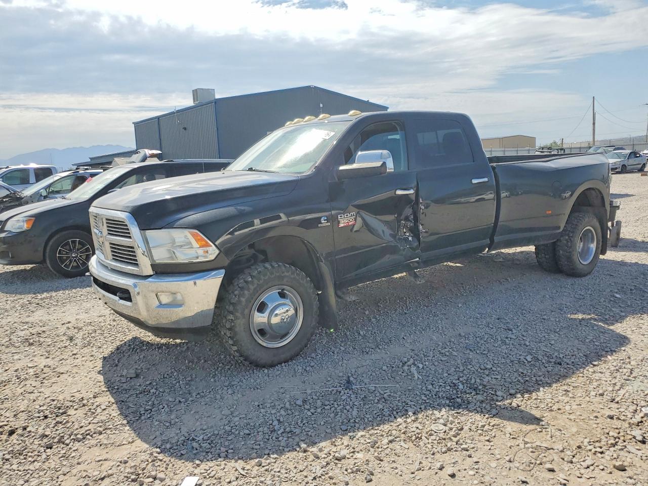 2011 Ram 3500 SLT, VIN 3D73Y4CL2BG558262 — Side
